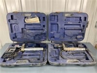 2-Lincoln Grease Guns each with a Case,