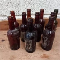 8 old Guinness Bottles "Goggin" and "O'Connor"