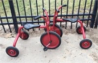 2 Red Tricycles