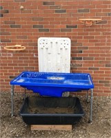 Water tables, basketball rims, plastic mud bin