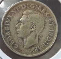 Silver 1947 Canadian quarter