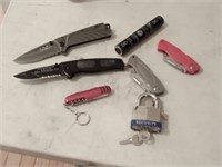 group of pocket knives & pad lock