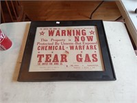 tear gas warning sign in frame