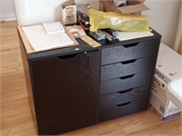 cabinet with office supply contents