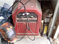 Lincoln electric AC/DC arc welder with rods