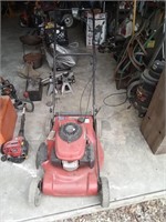 self propelled lawn mower with Honda engine
