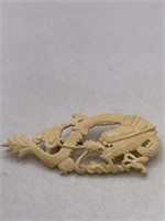 VINTAGE CARVED BONE BROOCH