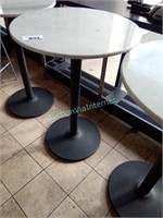 marble top tall round table