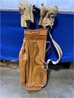 Leather golf bag with MacGregor and Spalding
