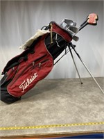 Titleist gold bag with Jack Nicklaus irons and
