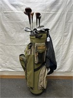 Wilson golf bag with assorted woods and clubs