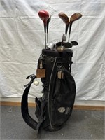 PGA golf stand bag and assorted golf clubs
