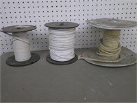 3 partial spools of wire
