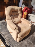 Side size suede tan swivel recliner rocker chair.