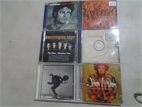 6 CD's , M Jackson ,J Hendrix ,Guns and Roses ande