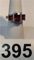 .925 sterling silver w/red stones ring sz. 7 1/4