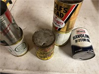 6 empty oil cans