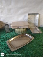 Aluminum pans, grater, and bundt cake pan.