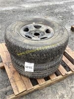 E2. (2) miscellaneous Tires on rims P265/7516