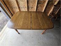 Heavy oak 5' kitchen table with one leaf