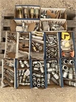 Open pallet of assorted hydraulic fittings