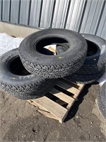 1 UNUSED & 4 well used tires LT235/85R16