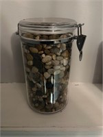 4 jars with rocks