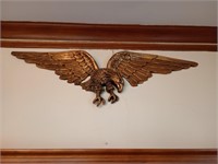 Amazing gold tone eagle. Approx 44 inches wide