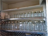 Large lot of canning jars and more.