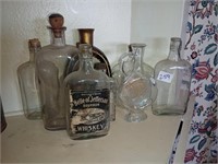 8 glass bottles incl Belle of Jefferson whiskey
