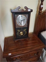 Alaron 31 day wind-up clock. 24" tall. Has key.