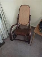 Large heavy duty woven back rocking chair. Seat