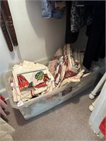 Tub of linens, including vintage, sheets, and