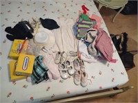 Fantastic lot of baby shoes and clothes, some