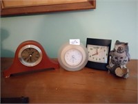 3 desk clocks and an owl figurine