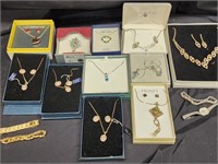 Costume jewelry most in boxes.  Necklaces and
