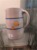 Crock style pitcher with candles