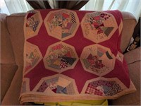 Pink spiderweb quilt handstitched