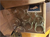 Glass mugs and stemware and duck coaster