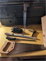 Calipers, handsaw, files, tape measure, bits,