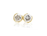 Pair of diamond solitaire & 18ct yellow gold stud