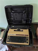 Cassette Electric Typewriter in case w paper,