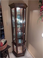 Lighted curio cabinet 25Wx10Dx71H w mirrored back