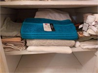 Shelf of towel and rags some new