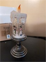 Lighted snowman candle snow globe 9 inches tall