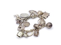 Heavy silver charm bracelet