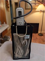 Bag of extension cords and surge protector