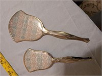 Vintage hairbrush and mirror with wear on handles