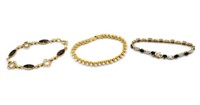 Three gemstone & gilt metal bracelets