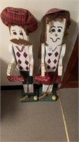 Two wooden golf decorations